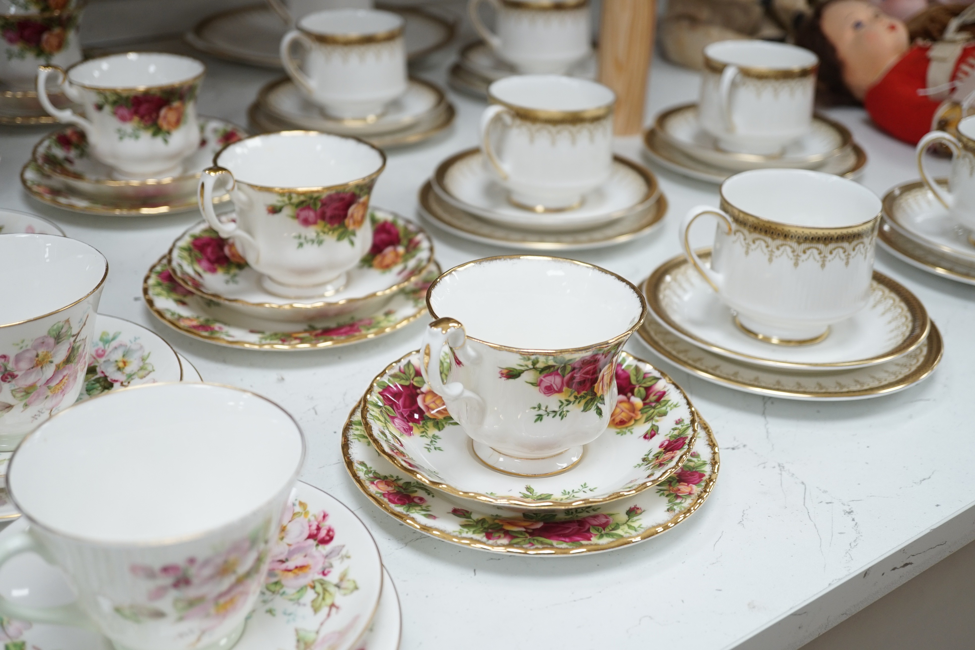 Four sets and part sets of bone china tableware, to include Royal Doulton Apple Blossom H4899, Royal Albert Old Country Roses, Paragon Athena, Tuscan Windsor, and Royal Vale D669. Approx 84 pieces